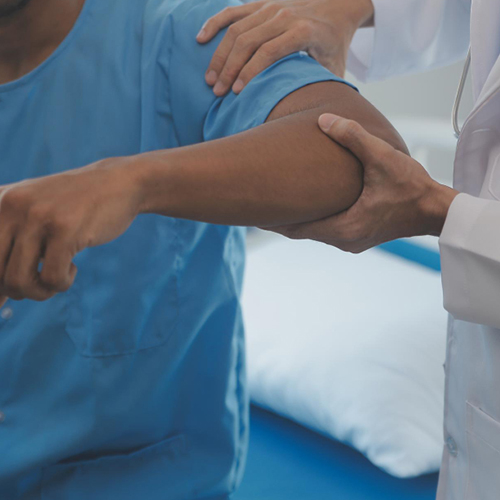 Orthopedic Surgeon Dr. Pavan Yadav evaluating joint pain